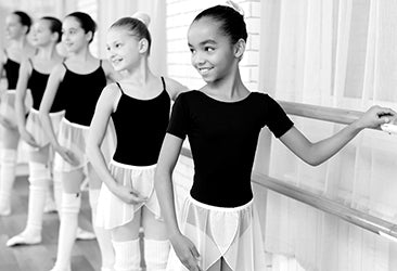 Dancewear leotards skirt and tights on children in ballet